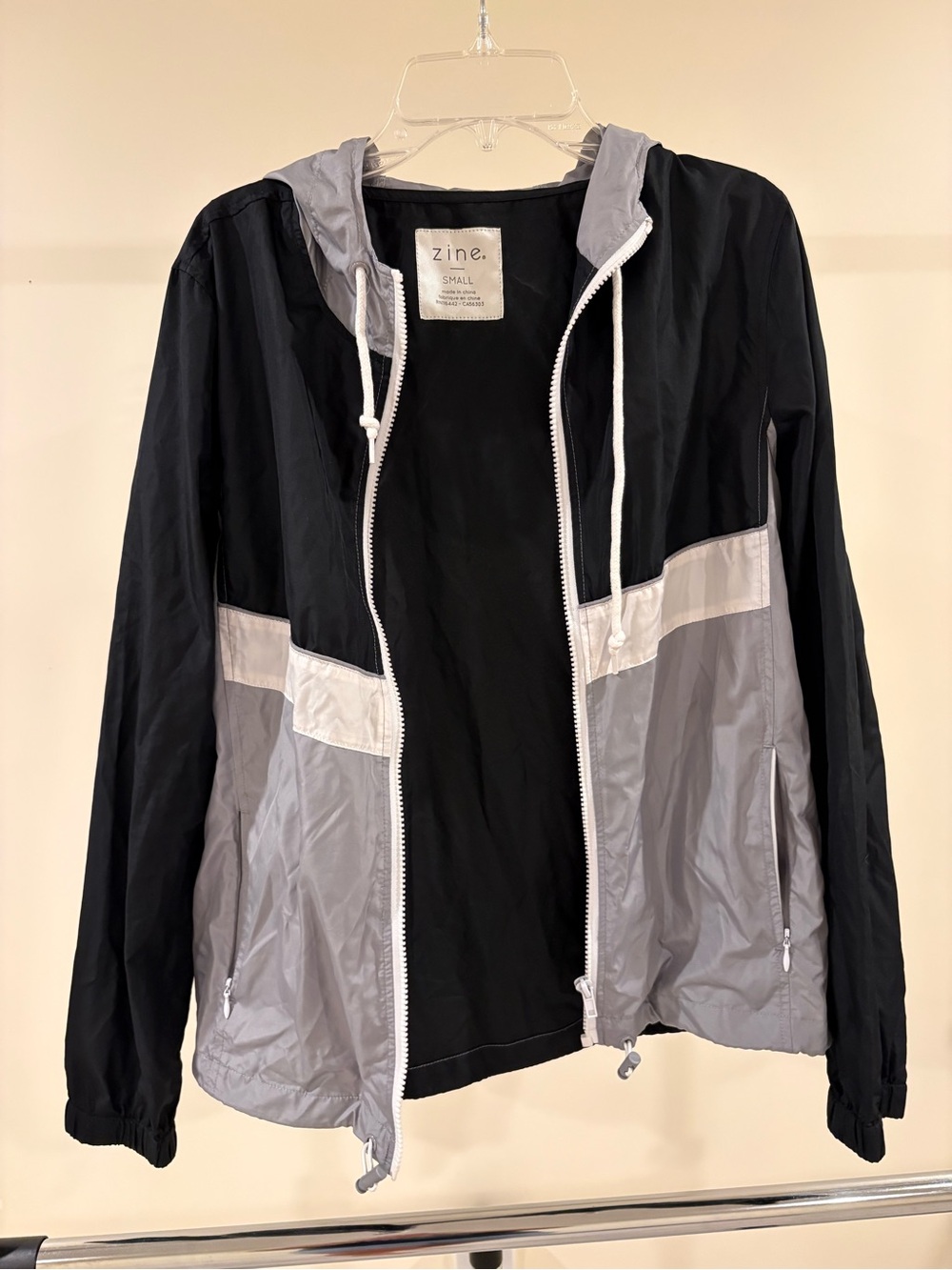 Zine Black Jacket with White Label